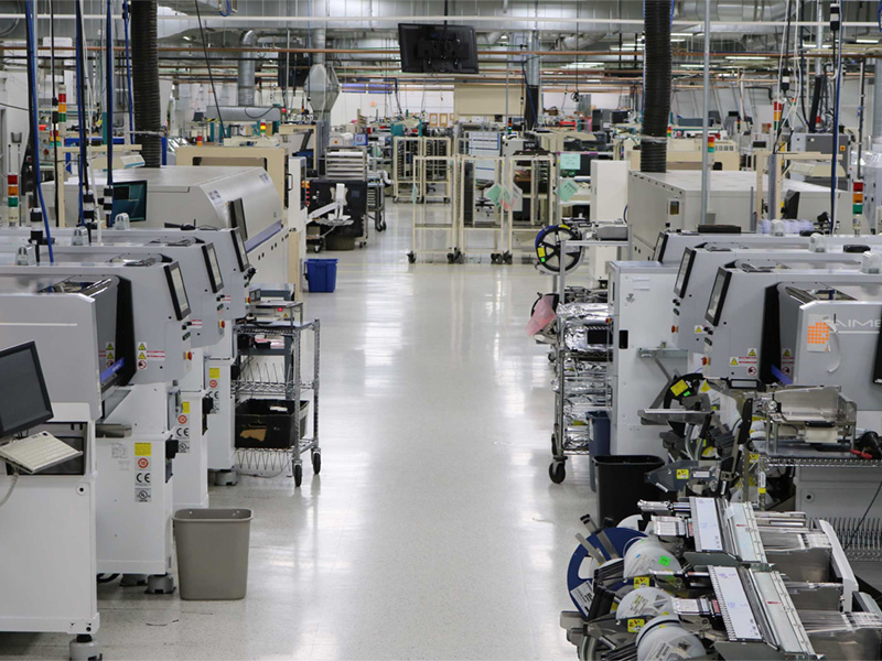 Rows of Machines in a Warehouse